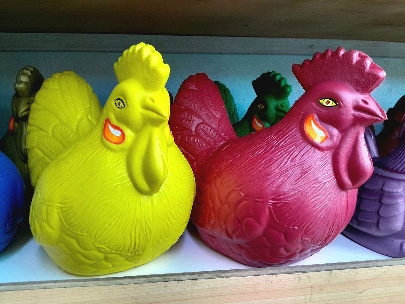 A piggy bank surrounded by coins representing personal savings and careful household budgeting.